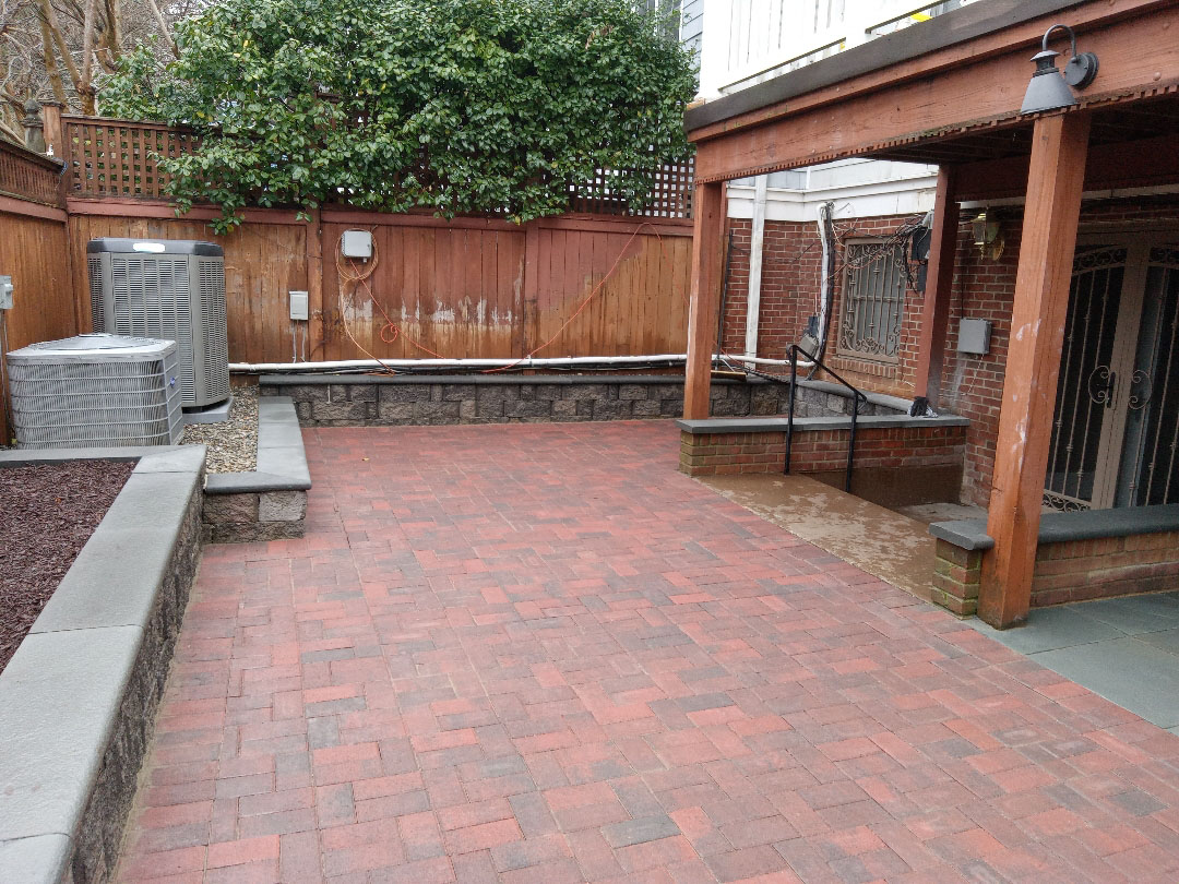 Final result of a completed project to convert a backyard into a patio terrace in Washington DC (Friendship Heights).